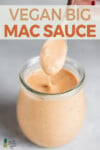 Vegan Big mac sauce in a jar with a wooden spoon for pinterest