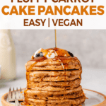 a stack of vegan carrot cake pancakes with a maple syrup drizzle for pinterest