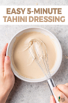 overhead image of bowl of tahini dressing with whisk for pinterest