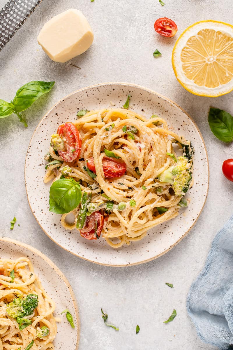 overhead image of pasta primavera on a white plate