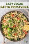 overhead image of pasta primavera in a pan for pinterest