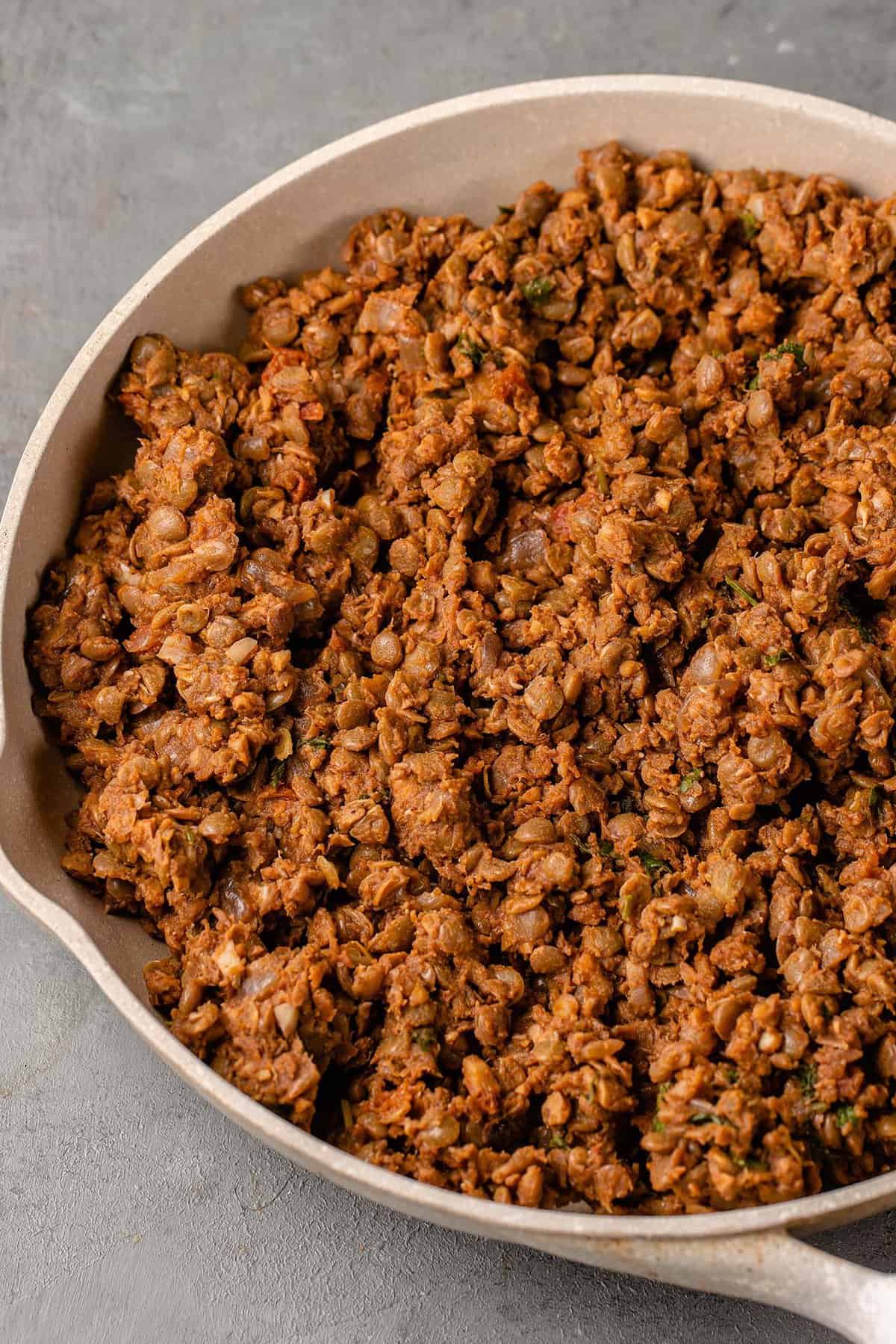 macro image of lentil and walnut taco meat in pan