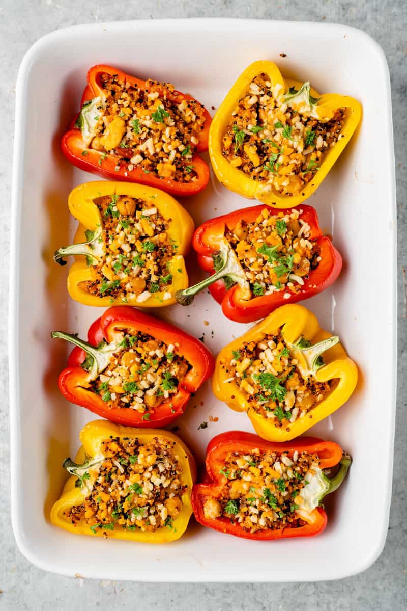overhead image of cooked stuffed peppers in a baking dish
