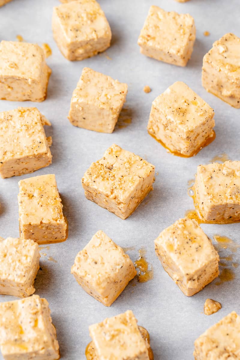 uncooked tofu on baking sheet