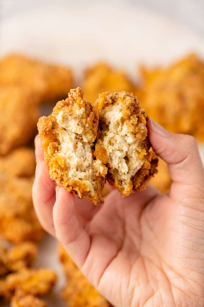 overhead image of vegan fried chicken cut in half