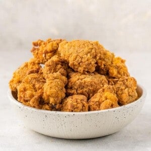 straight forward image of vegan KFC fried chicken in bowl on white background