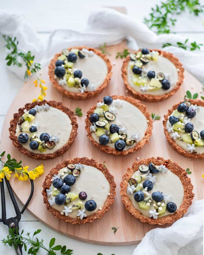 overhead image of lemon cheesecake tartlets. 