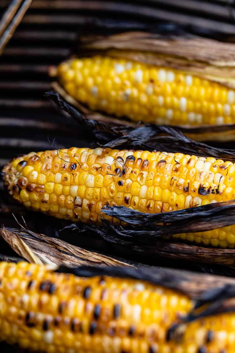 charred corn on the grill