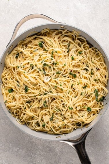 garlic and herb pasta in gray pan