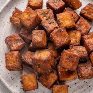 overhead image of herbed tofu on a plate