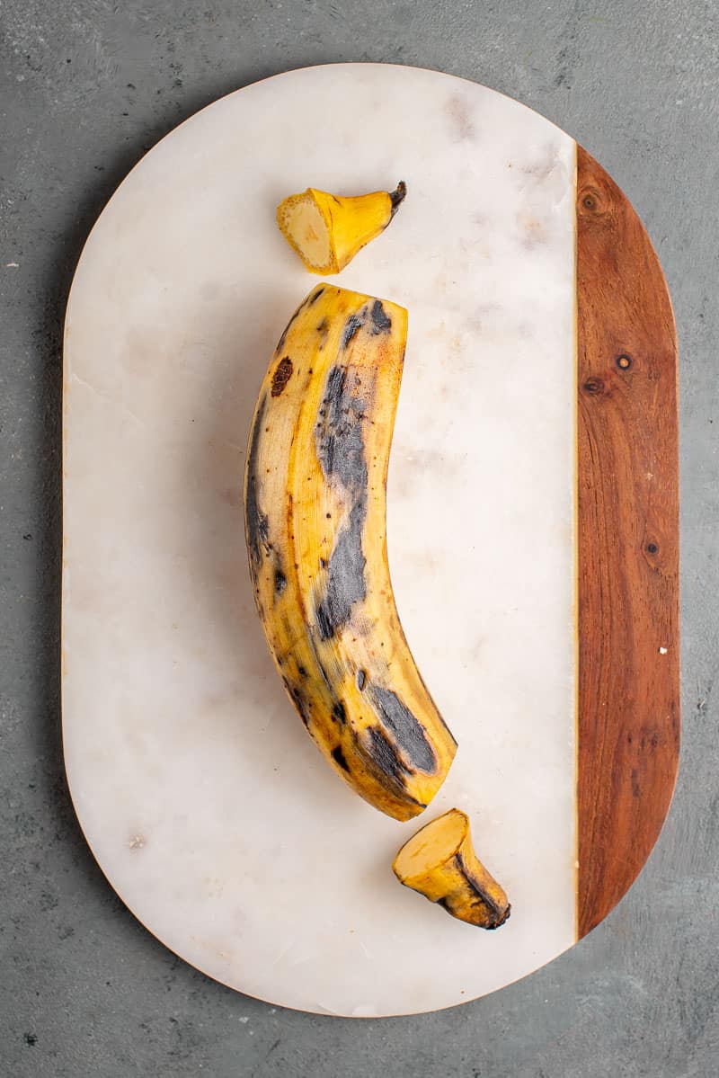 process shot of plantain being peeled