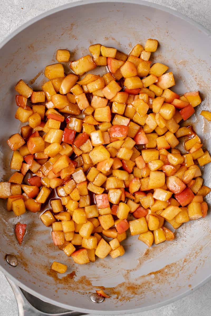 caramelized apples cooking in a pan