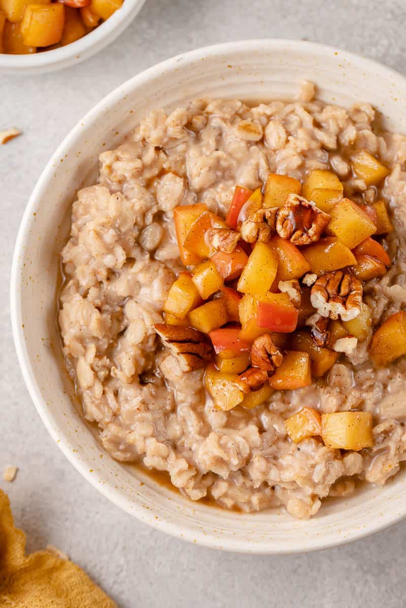 up close image of apple cinnamon oatmeal in a bowl