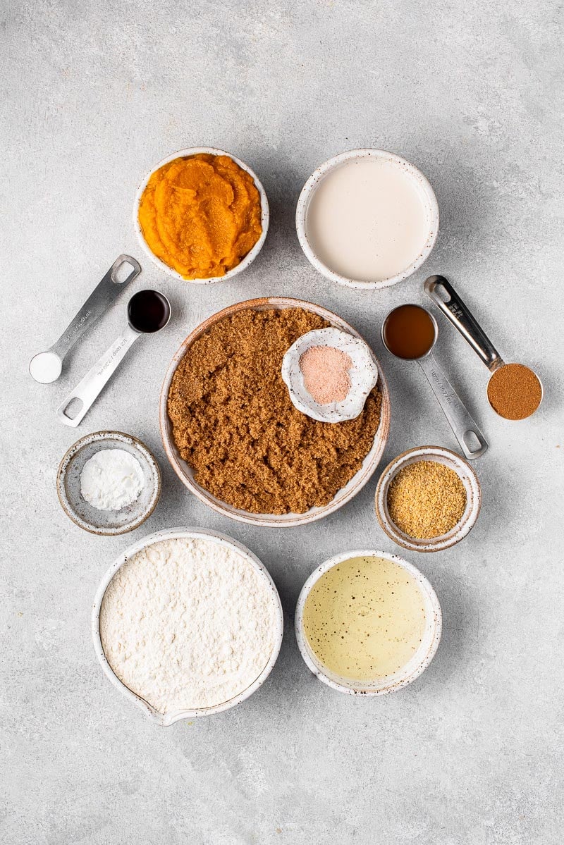 ingredients for vegan pumpkin bread on white board