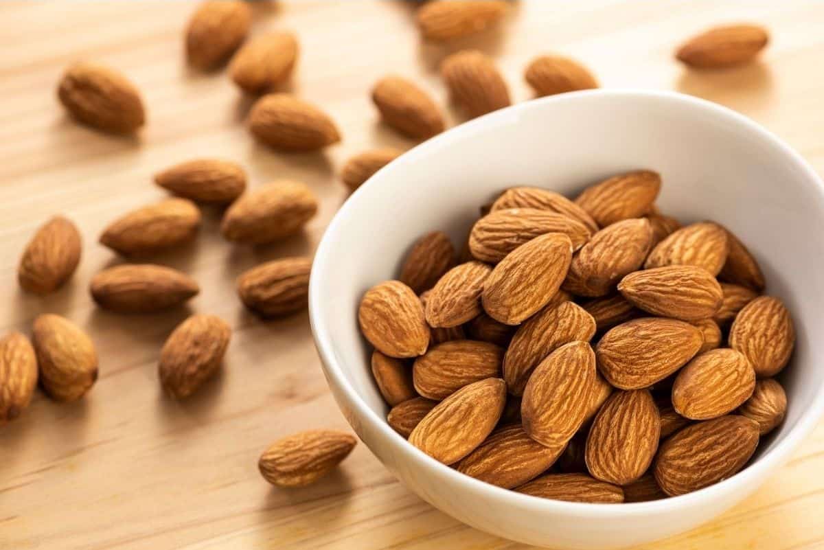 image of almonds spilling onto a table for vegan Nutrition myths debunked