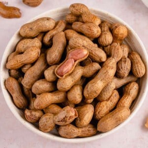 horizontal photo boiled peanuts in a white bowl