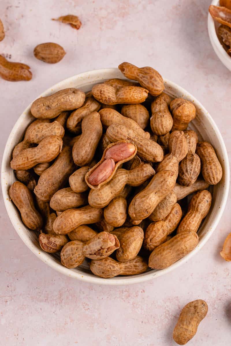 boiled peanuts in a white bowl