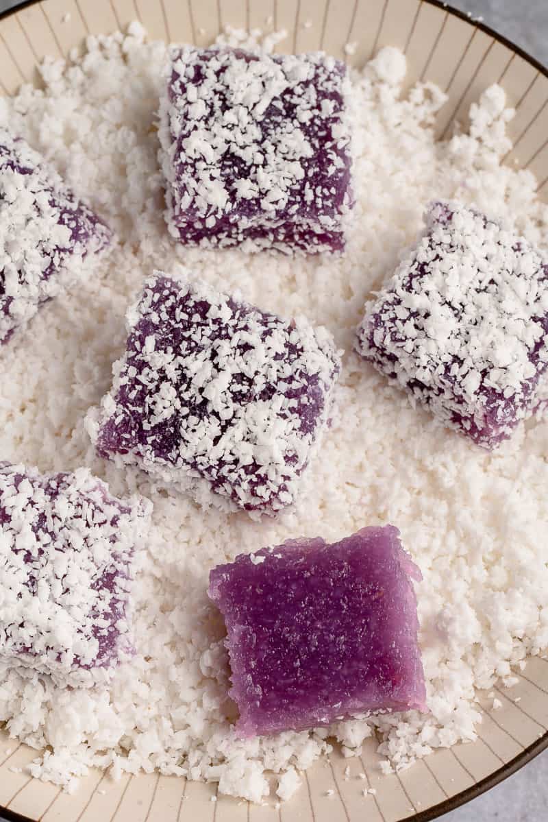 ube pichi pichi being tossed in coconut