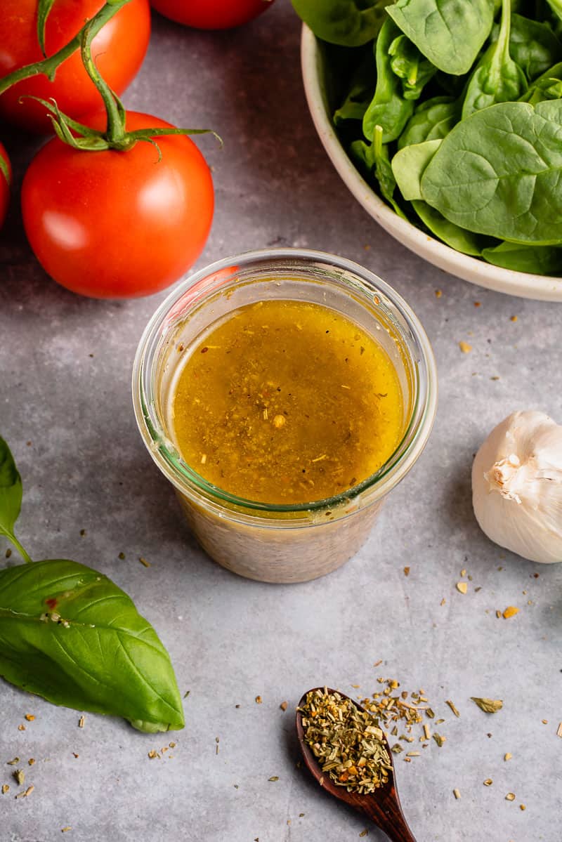 overhead image of easy italian dressing styled on background