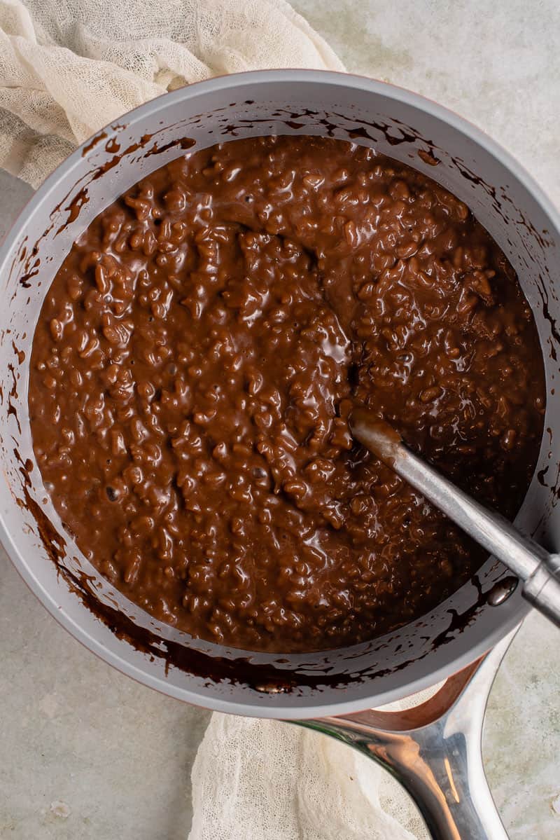 pot of champurado with spoon