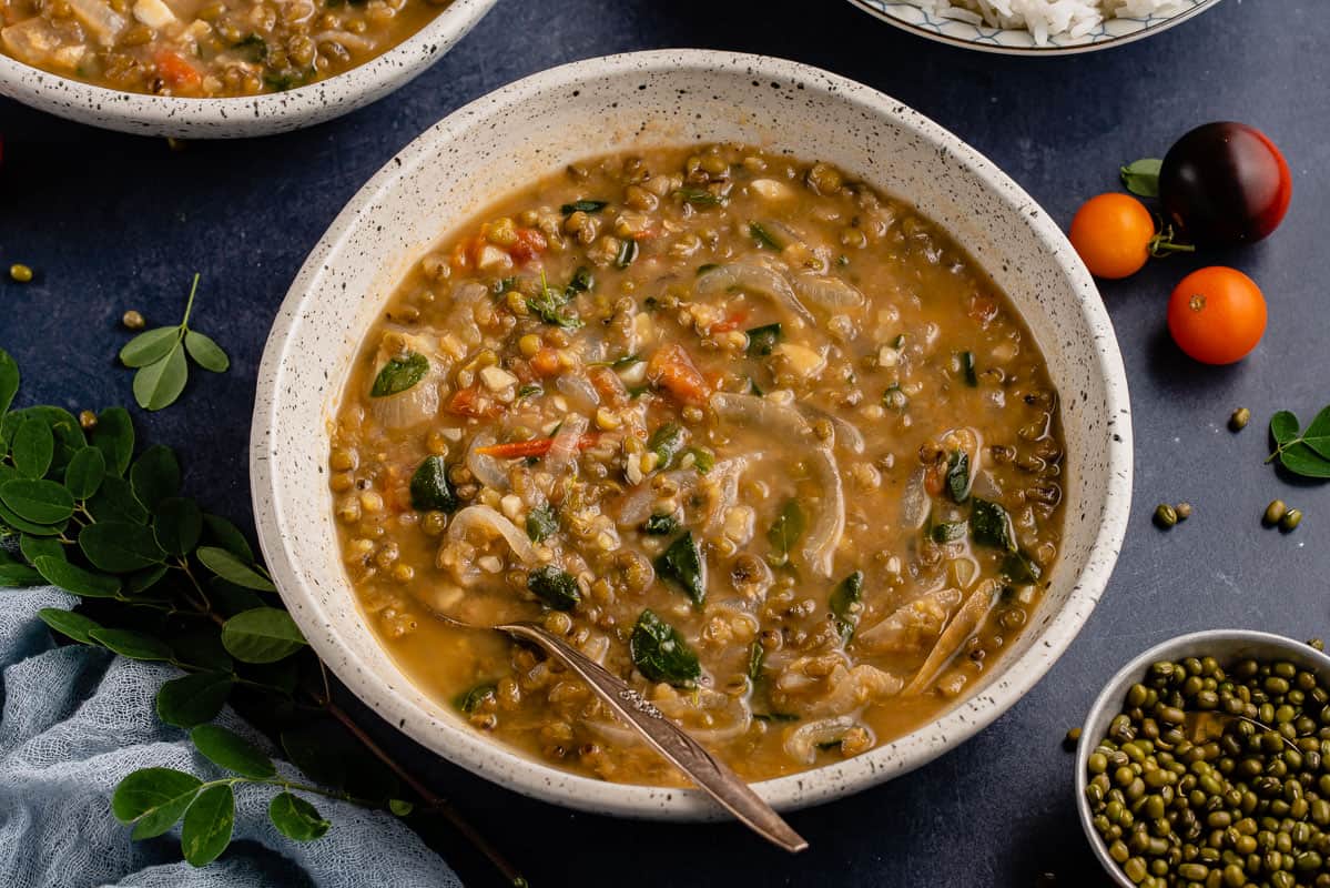 horizontal image of mung bean soup with spon