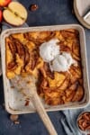 vegan apple cobbler with ice cream in gray dish