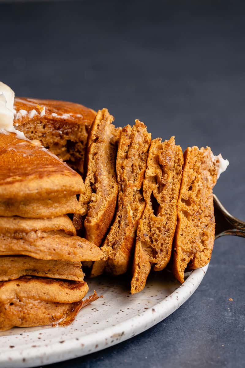 sliced pieces of vegan gingerbread pancakes on fork