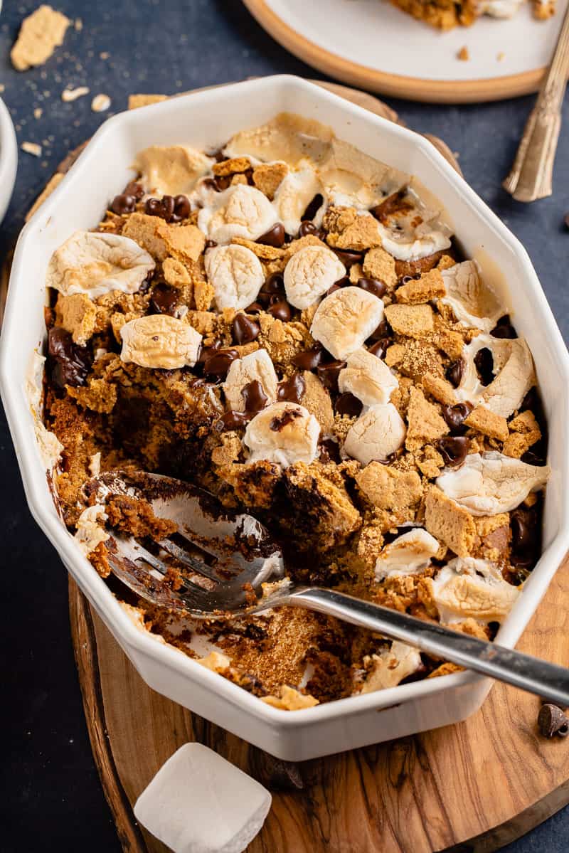 angled image of baked oatmeal in a casserole dish