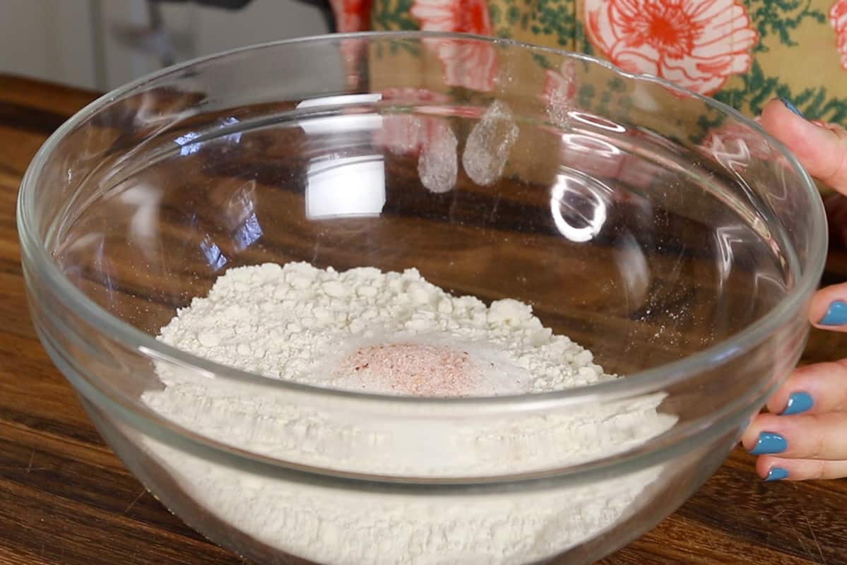 dry ingredients for pie crust in a glass bowl