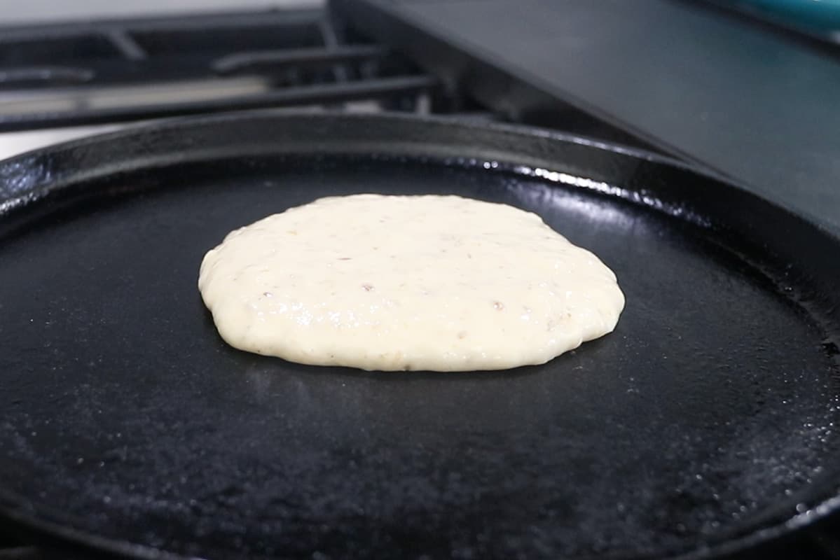 cooking buttermilk pancakes on cast iron griddle