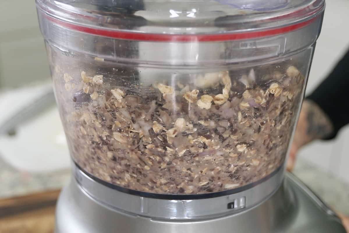 food processor with ingredients for black bean burgers