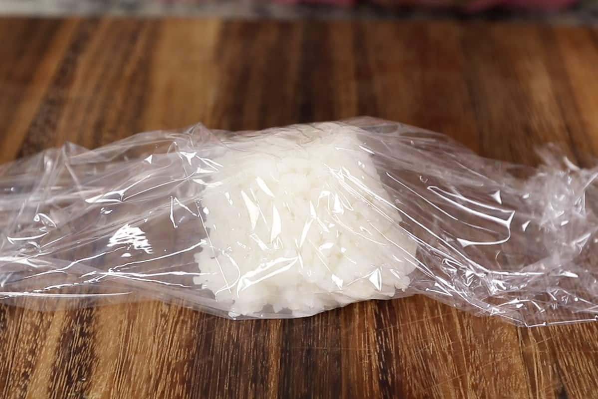 sushi rice in plastic wrap for musubi