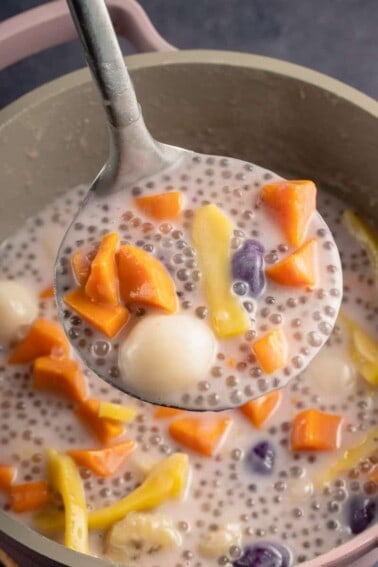 close up photo of ginataang bilo biilo being scooped out of pot with a metal ladle
