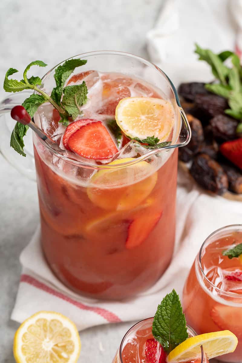 overhead photo of large full pitcher of strawberry lemonade