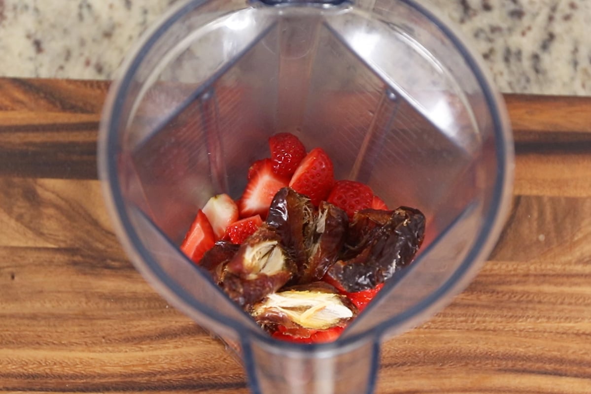 ingredients for homemade strawberry lemonade in a vitamix blender