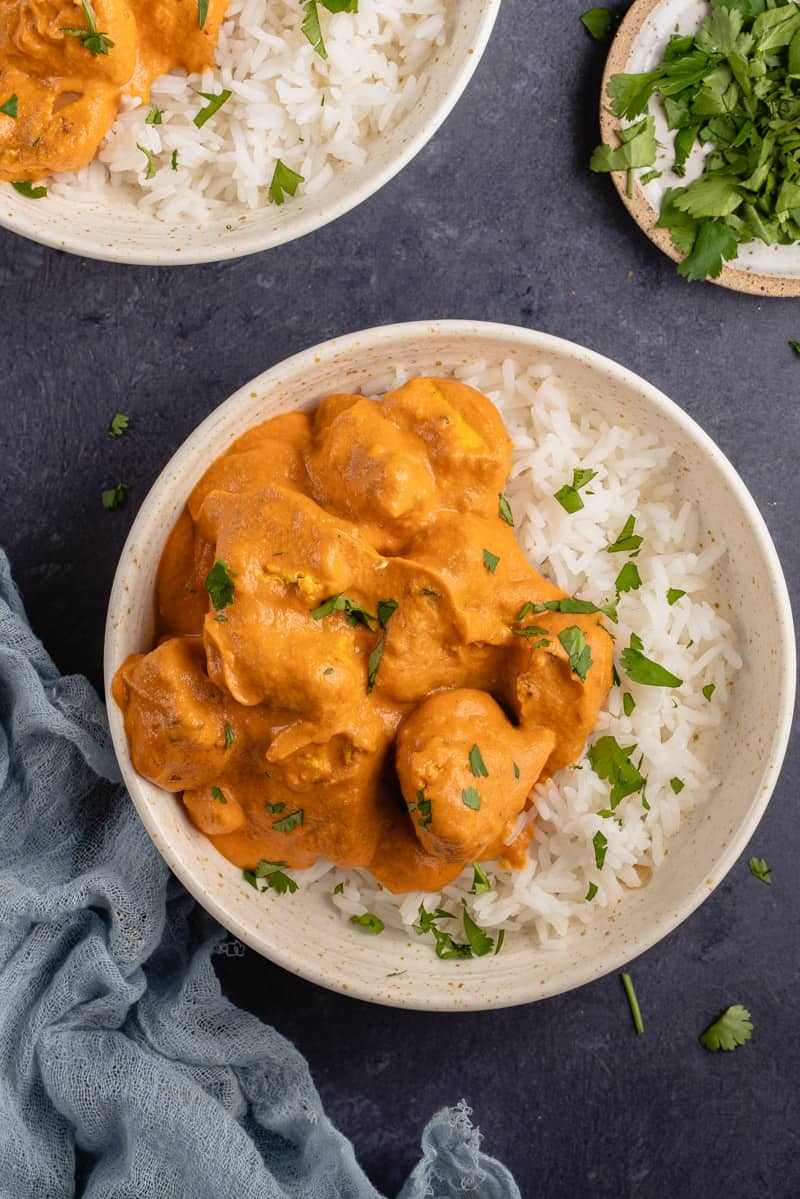 overhead of bowl with vegan butter chicken and rice