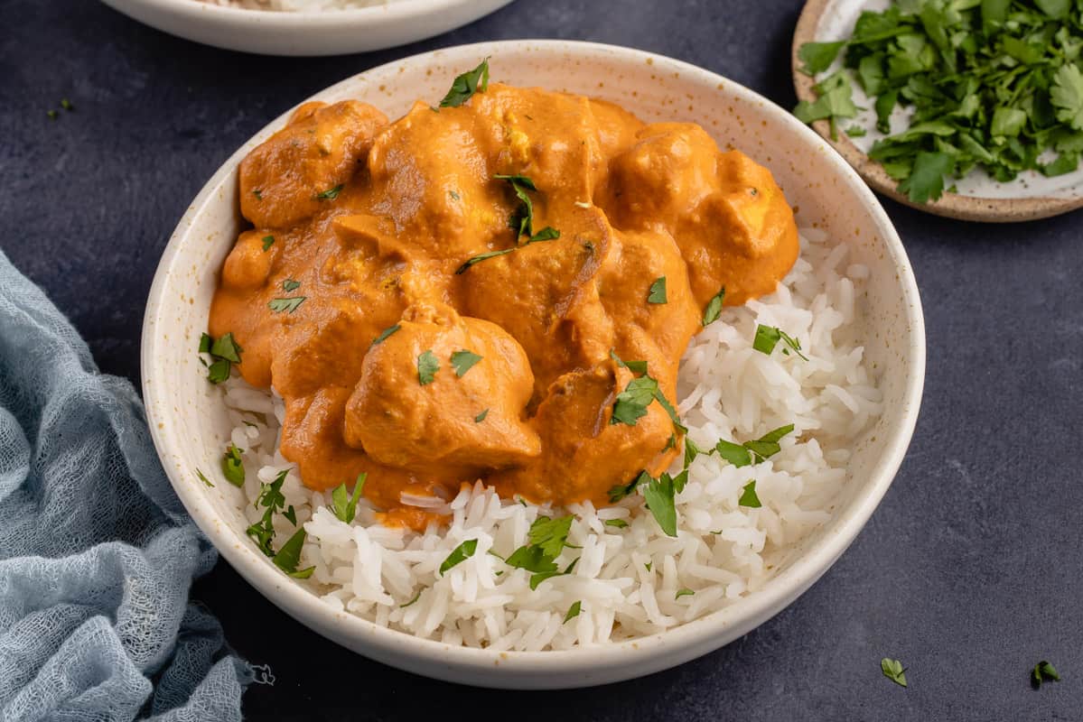 vegan butter chicken with rice in a bowl
