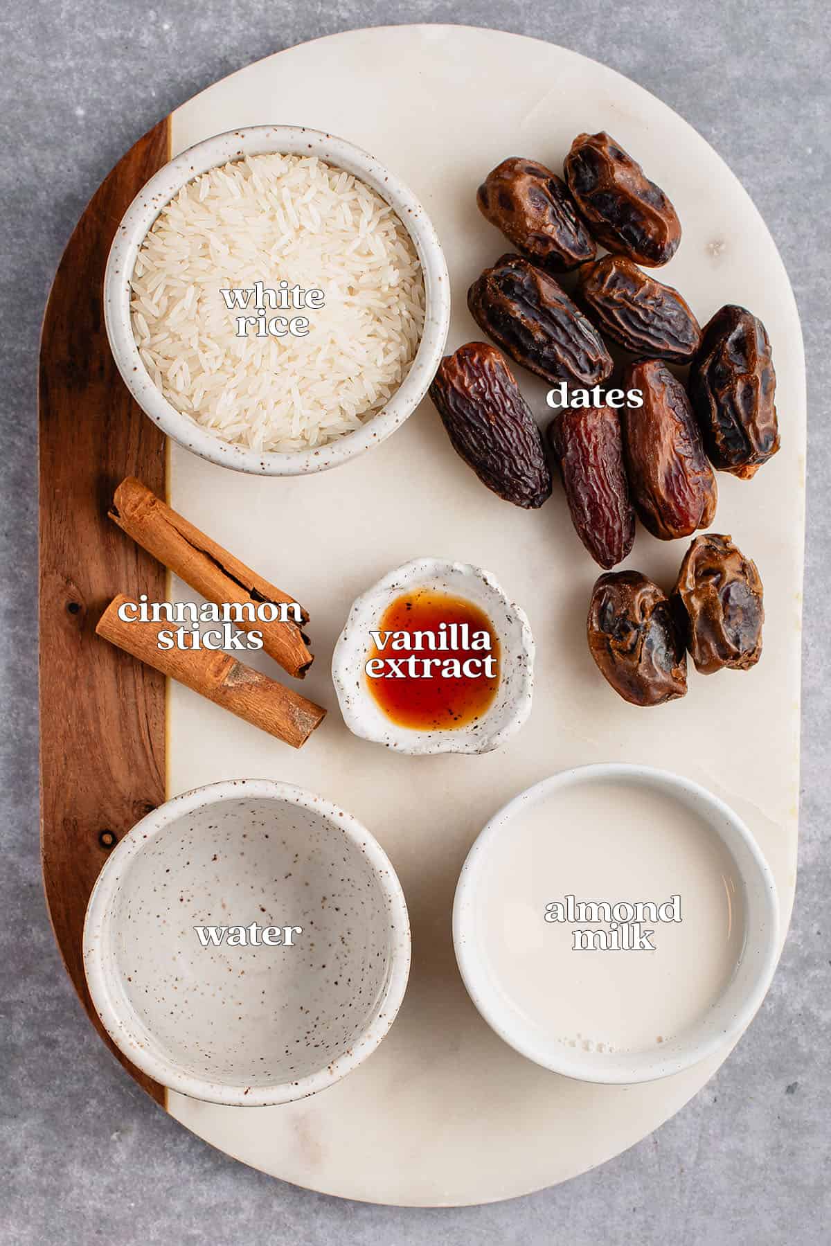 ingredients for date sweetened horchata on marble board