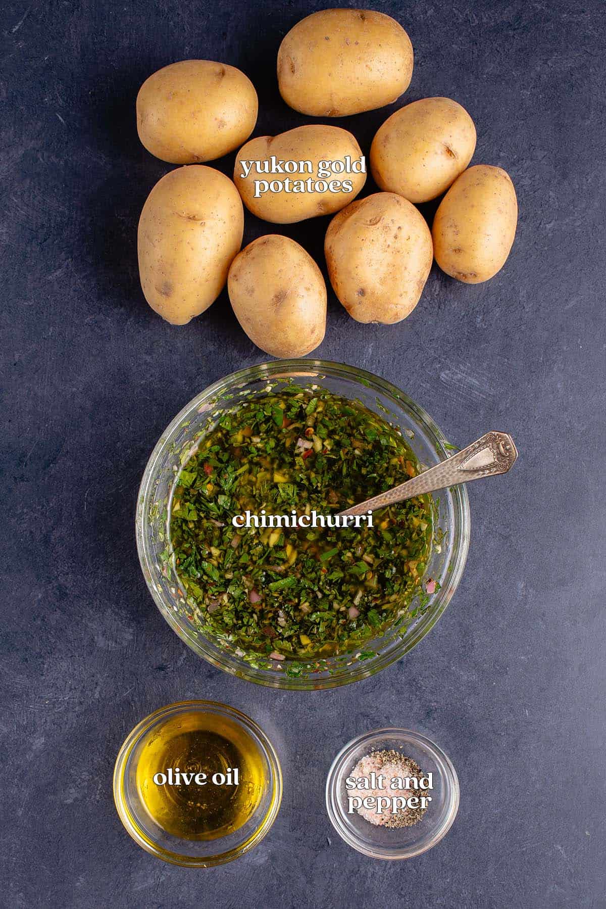 ingredients for Roasted Smashed Potatoes with Chimichurri on blue background
