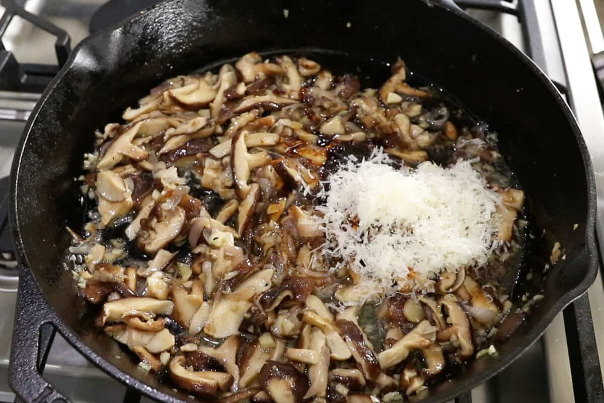 sautéed mushrooms and parmesan in cast iron skillet