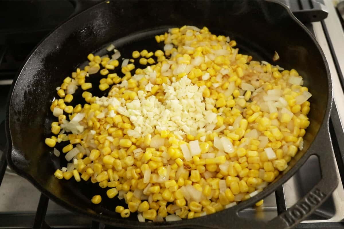 step by step of ingredients for corn sauce in pan