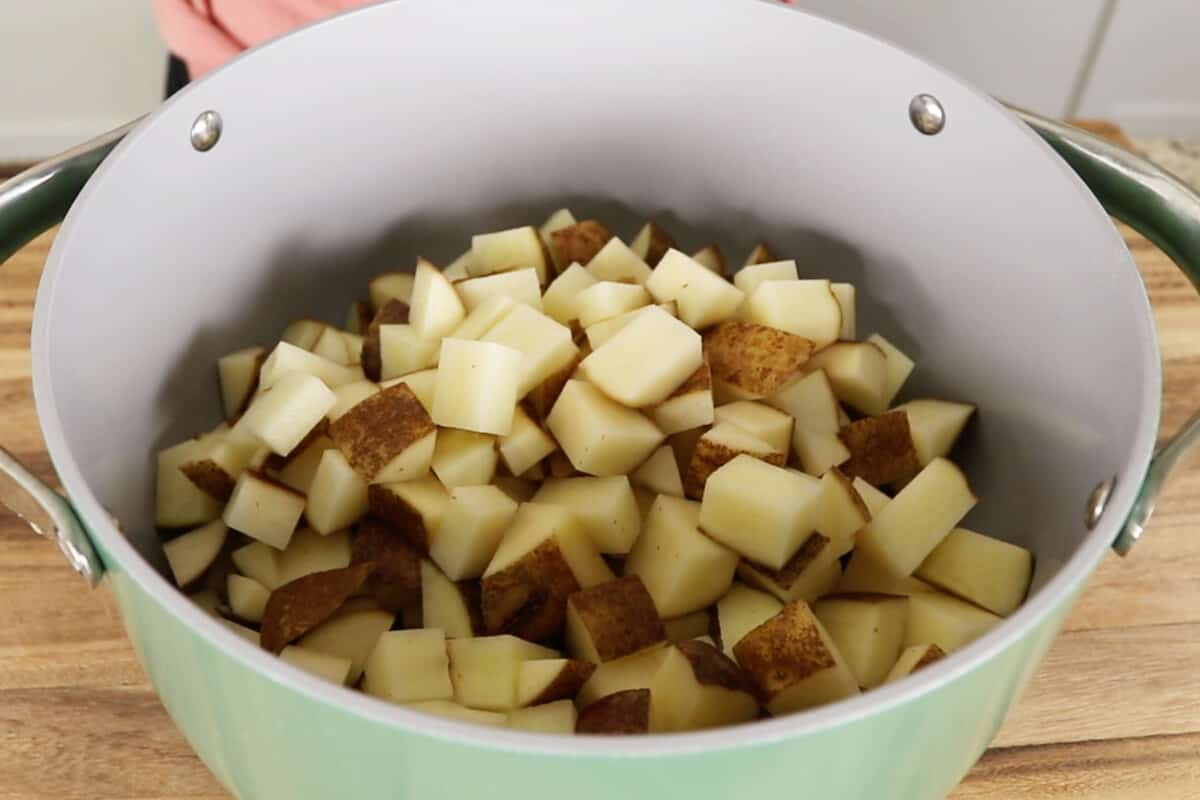 uncooked potatoes in large pot