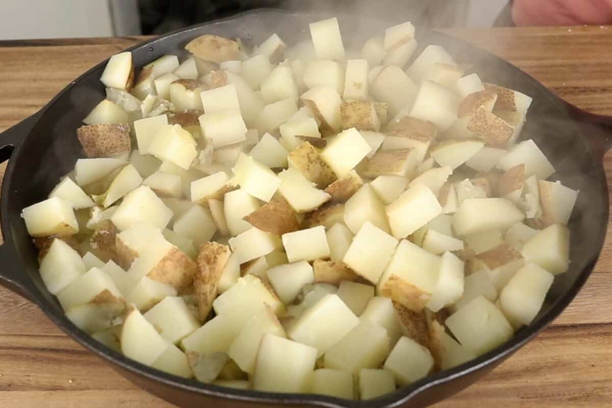 steamed potatoes in a skillet