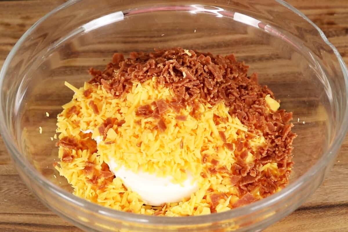 step by step. cream cheese, cheddar, and bacon in a glass bowl