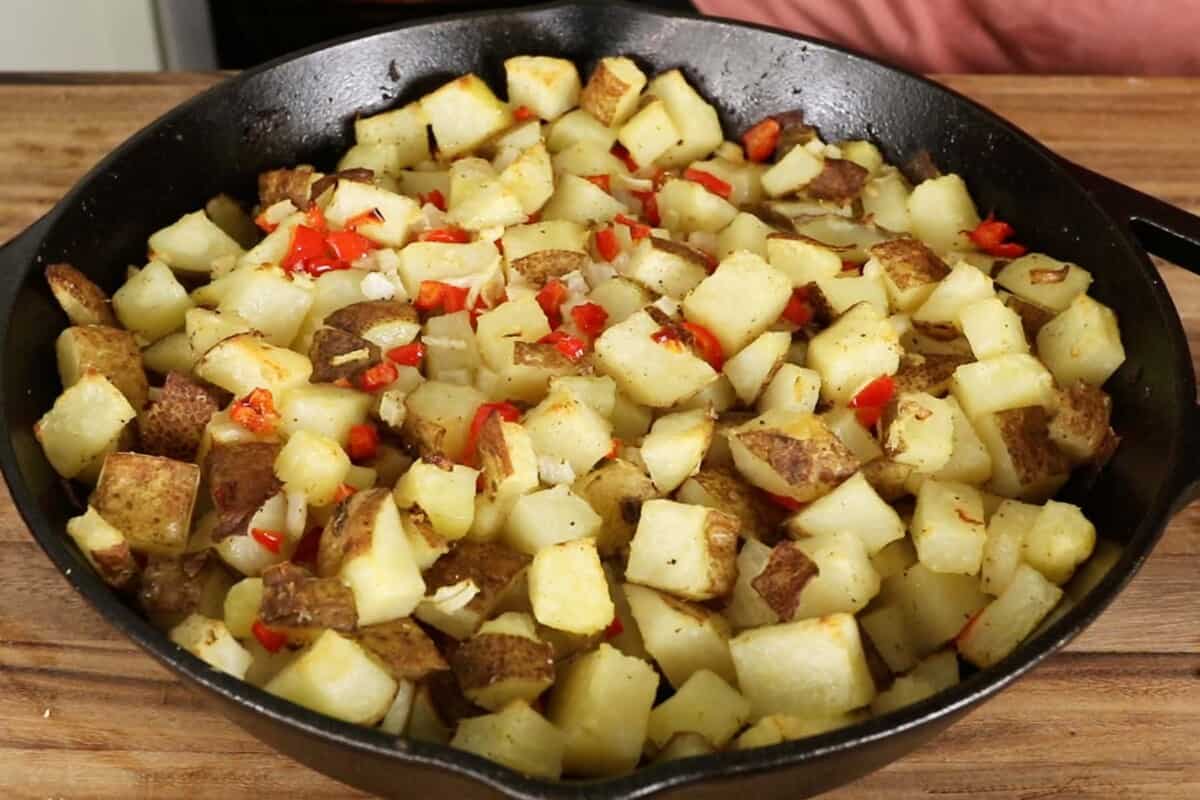 step by step cooked potatoes onions and peppers
