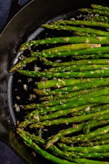 pan-fried asparagus in black hexclad pan