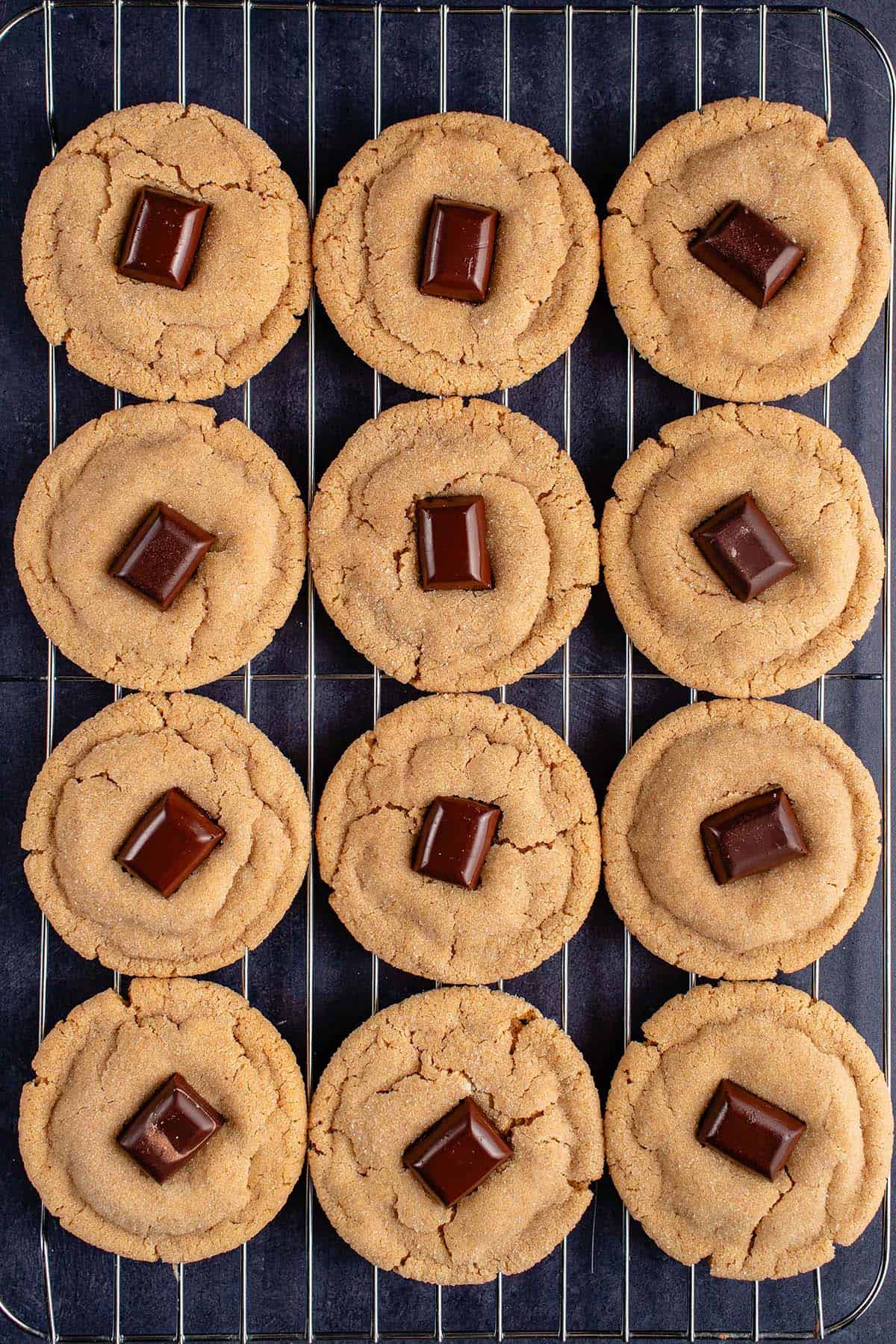 peanut butter blossom cookies on a cooling rack