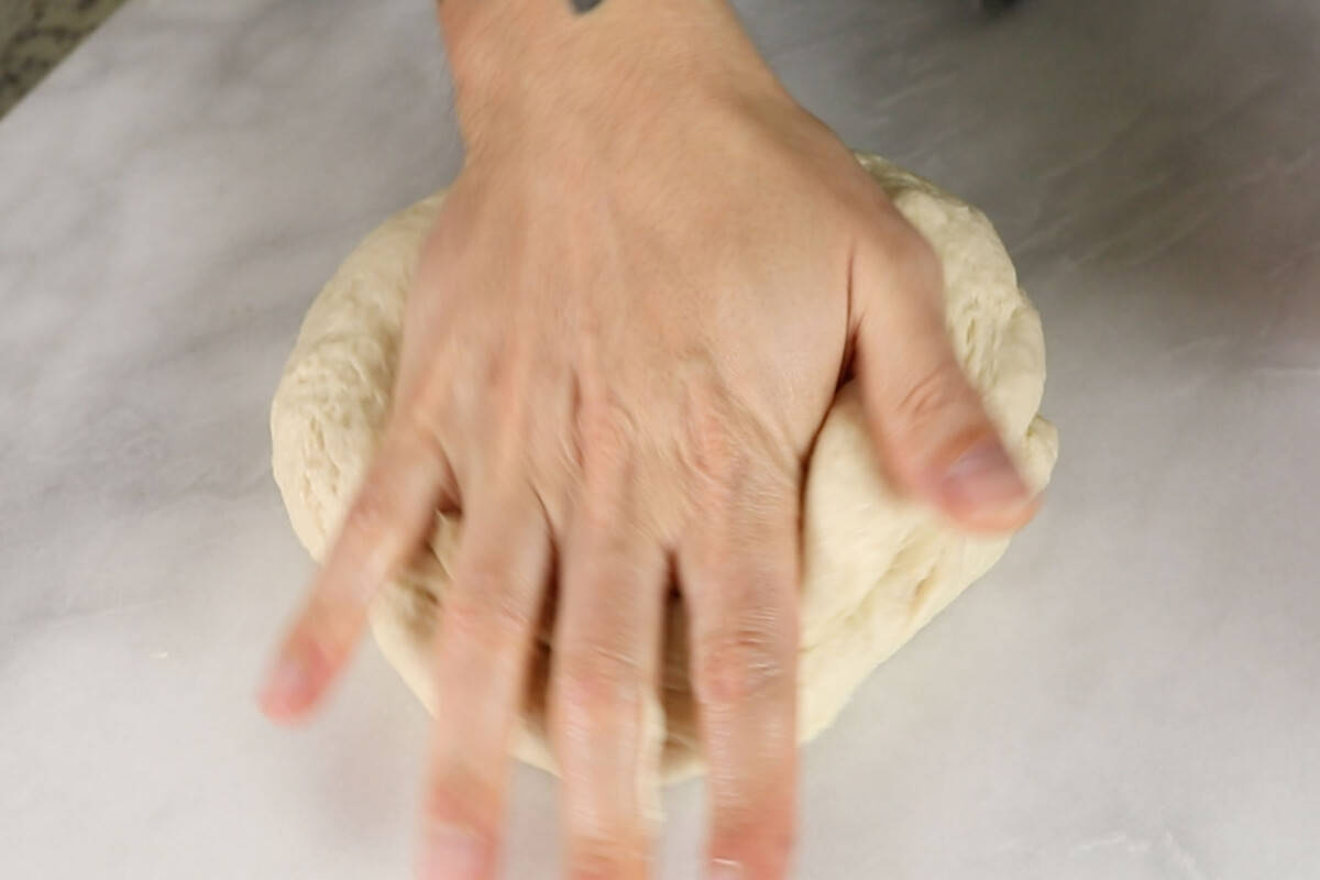 kneading vegan ensaymada dough 