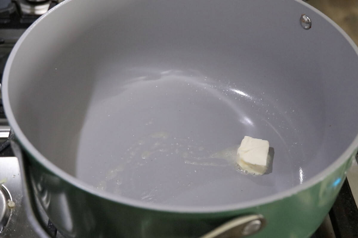 melting vegan butter in green pot