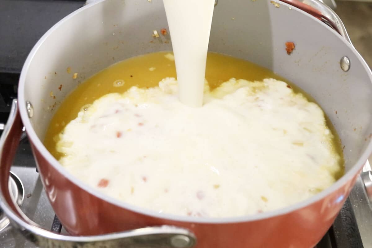 cream being added to pot